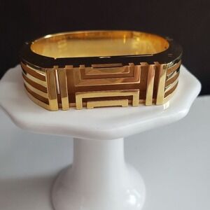 Tory Burch Gold Tone Fit Bit Cutout Hinge Bangle Bracelet with Dust Bag